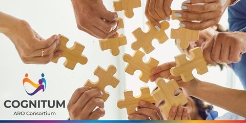 Image of multiple people holding jigsaw pieces and Cognitum Consortium logo