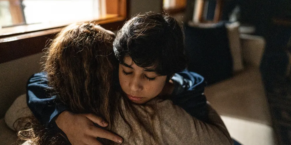 Child hugging his mom