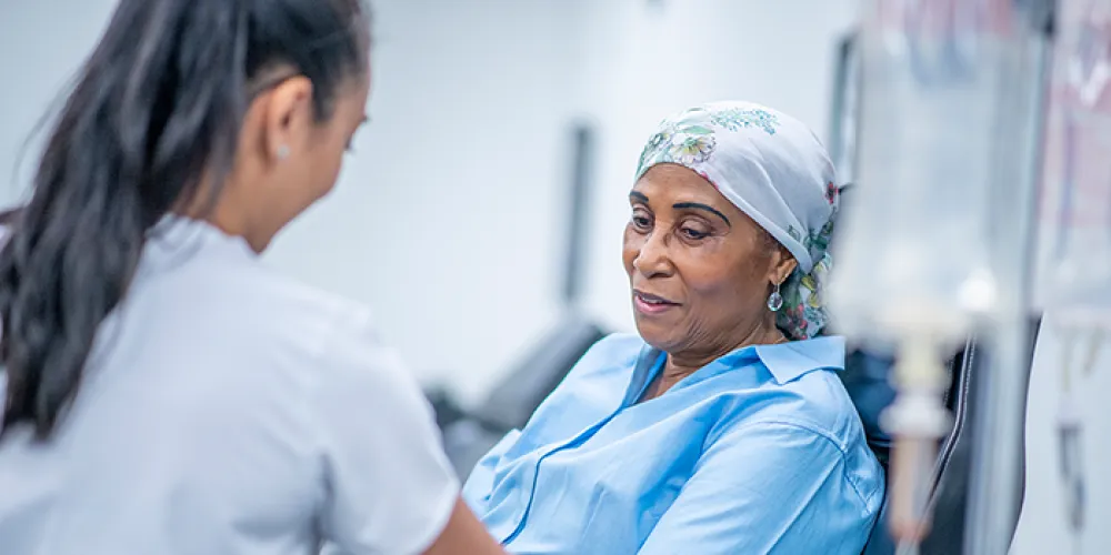 Two women in a hospital setting