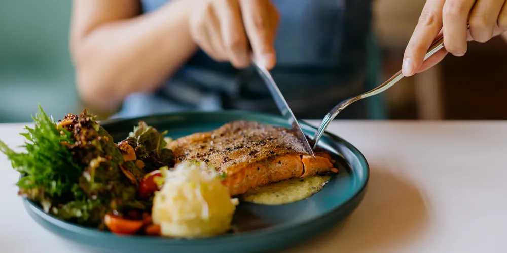 Carving fish on a plate