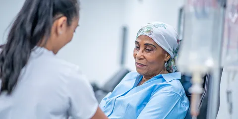 Two women in a hospital setting